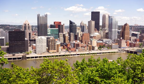 Pittsburgh Pennsylvania downtown skyline overlooking one of the rivers